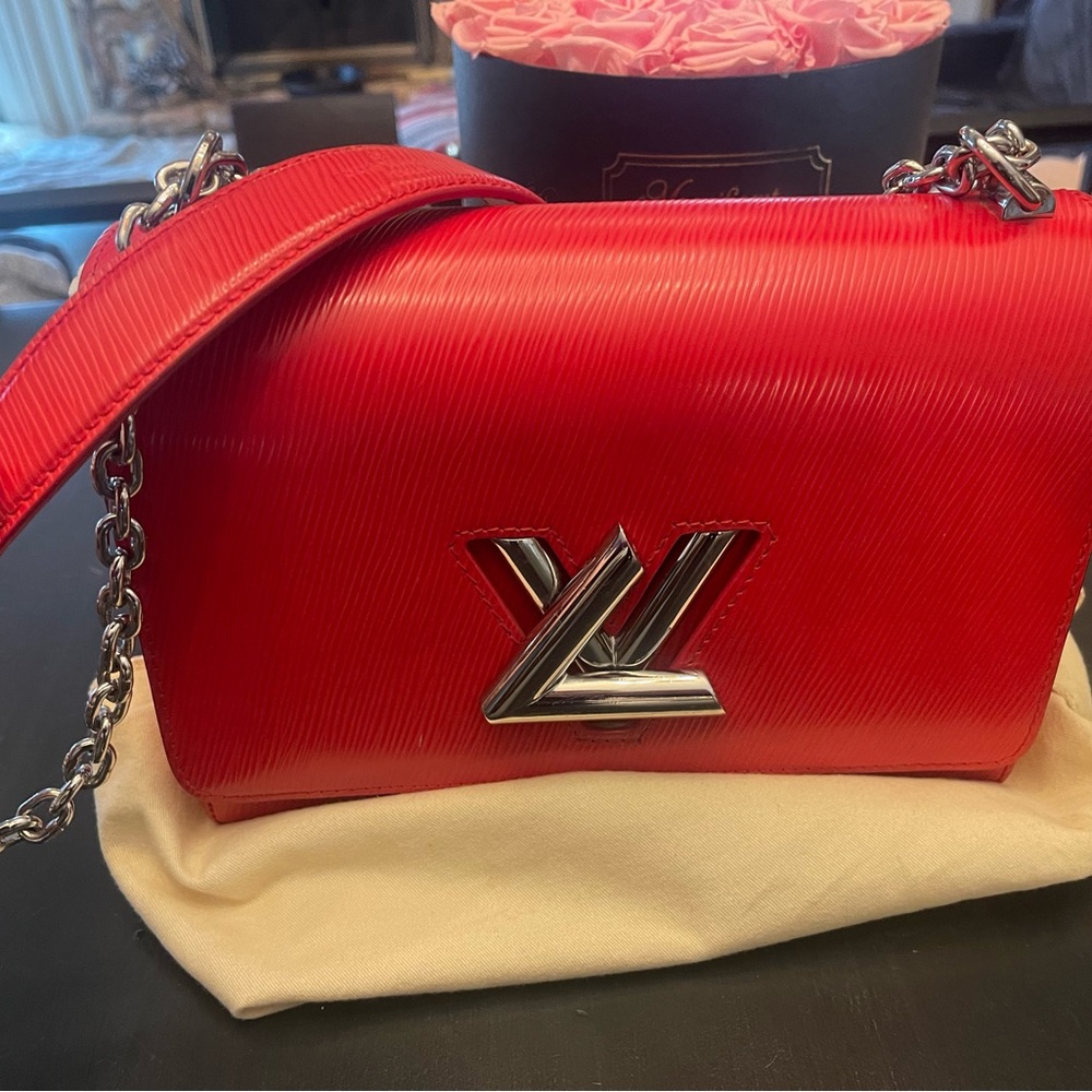 Louis Vuitton red leather twist cross bag.